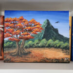 Acrylbild, auf dem ein Flammenbaum vor dem Piton de la Petite Riviere Noire zu sehen ist